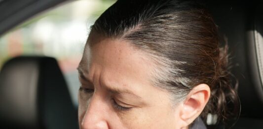 policewoman sitting in the car